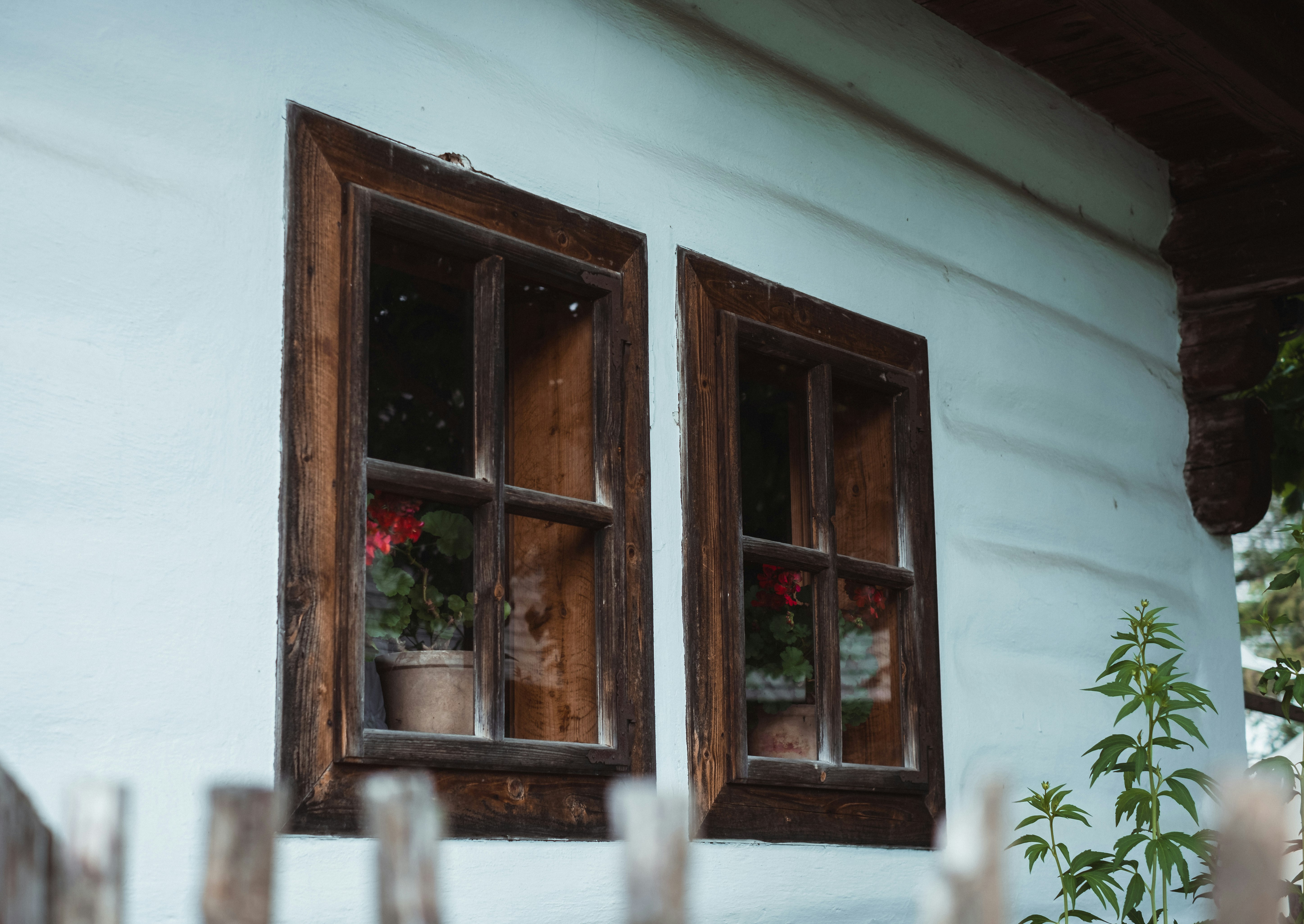 brown wooden framed glass window